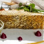 Lup de Chile file la plita, piure cu trufe si mix salate